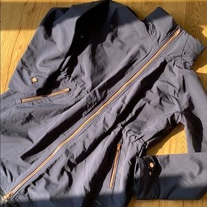 Athleta ‘Misty’ Rain Jacket Navy rosegold accents.